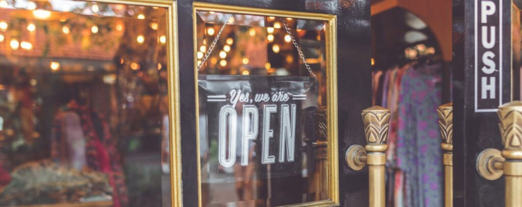 An open start-up shop door with an open sign