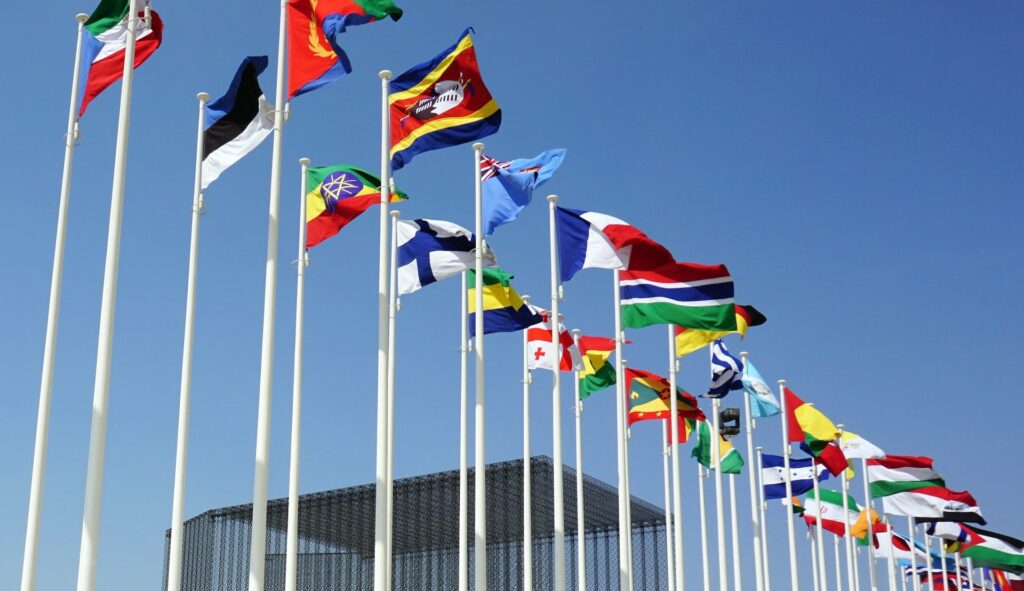 Flags of multiple countries symbolizing globalization and global expansion